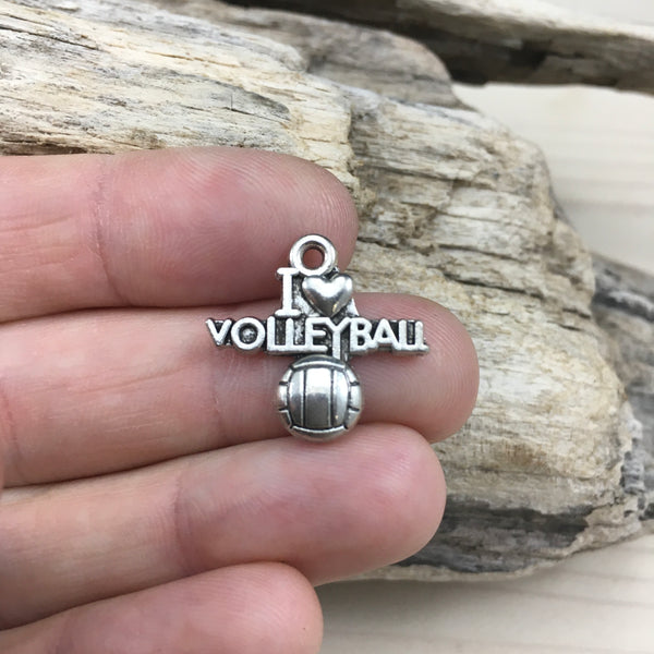 Breloque volley-ball qui sera ajoutée à votre bracelet, collier ou boucles d’oreilles
