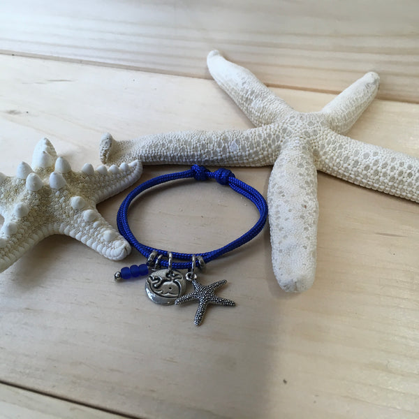 #204 Bracelet ajustable avec baleine et étoile de mer