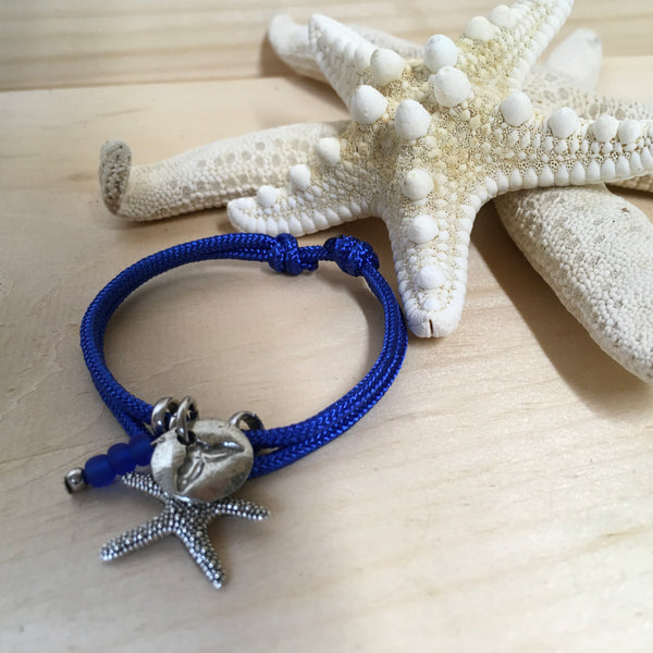 #121 Bracelet ajustable avec étoile de mer et queue de baleine
